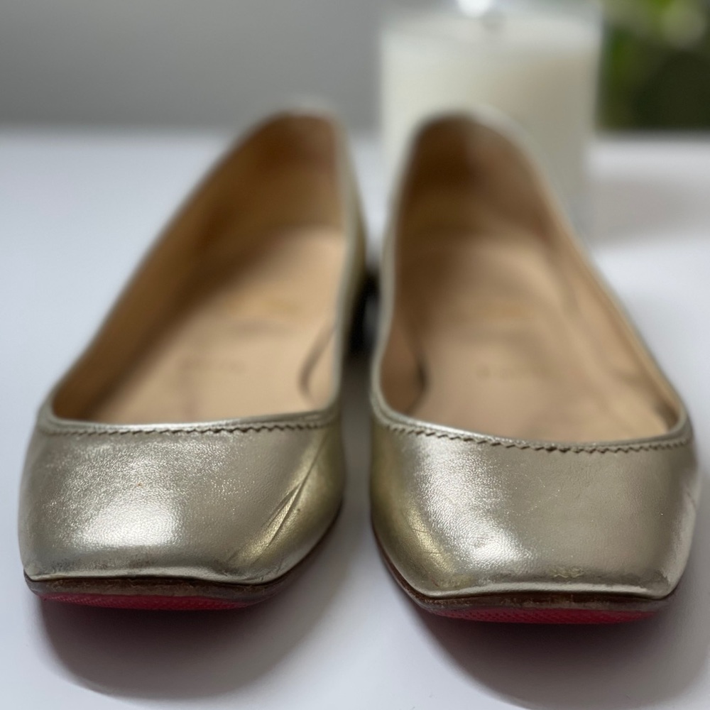 AUTH Louboutin metallic flats, Fit like 8